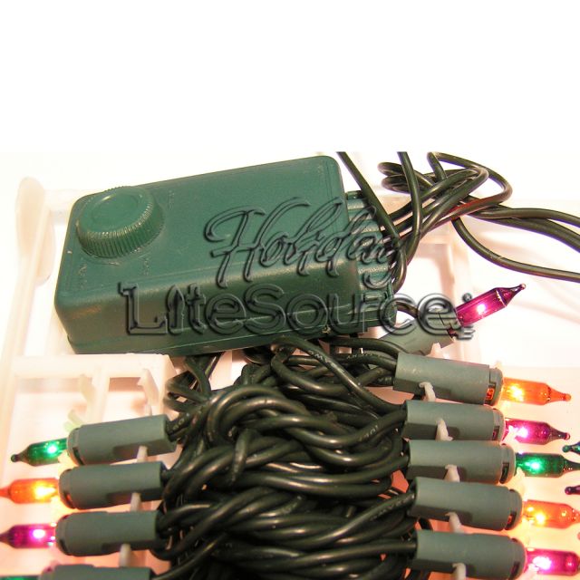 140 Light Chasing Amber, Purple and Green Mini Lights on Green Wire