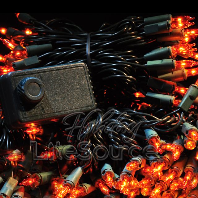 Chasing Amber Mini Lights on Green Wire